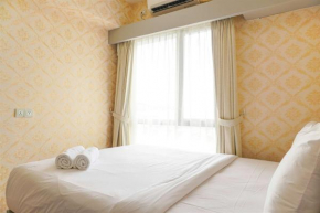 Spacious and Nice 1BR with Extra Room at Sky House BSD Apartment By Travelio